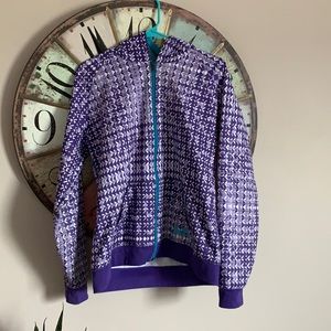 Purple and teal Under Armoir zip-up hoodie.